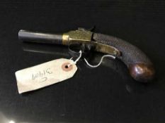 A nineteenth century percussion pistol