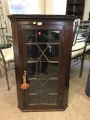 A Victorian mahogany hanging corner cabinet