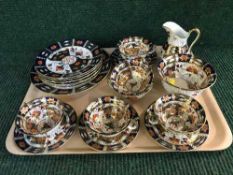 A tray of twenty-one piece Ford & Pointon Imari pattern tea service
