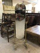 A brass framed cheval mirror