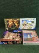 Two boxes of jigsaws