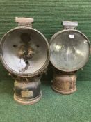 A pair of antique ship's spot lights