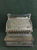 An early twentieth century American National Cash register with key