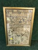 A gilt framed Regency alphabet sampler dated 1813,