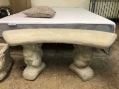 A shaped garden squirrel bench