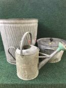 A galvanised wash tub together with a lidded pot,