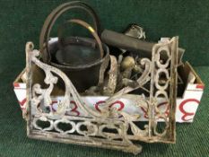 A box of two jam pans, two cast iron metal wall brackets, door plates,