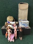 A box of mid twentieth century plastic dolls, doll clothing and accessories,
