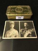 A First World War Princess Mary Christmas tin, containing one of the original cigarettes,