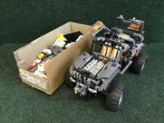 Four boxes of Lego and instruction books