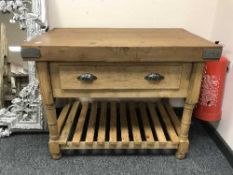 A reclaimed pine butchers block fitted a drawer