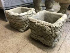 A pair of garden ivy planters