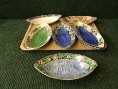 A tray of seven Maling shallow oblong dishes