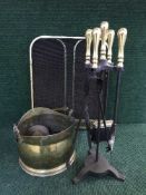 A three way folding spark guard, five piece companion set,