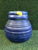 A Carlton ware ribbed vase (blue),