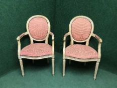 A pair of contemporary salon armchairs