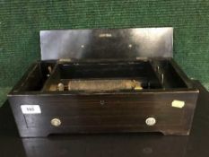 A Victorian inlaid rosewood music box