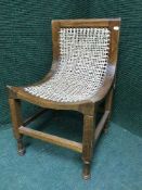 A child's bergere seated chair
