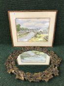 An oak framed watercolour by Reg Baxter dated 1989 depicting a rural village together with a