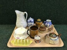 A tray of Devon ware teapots, Arthur woods tankard and preserve pot, Gibson and sons preserve pot,
