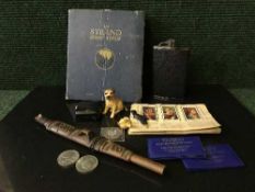A tray of collectables to include a hip flask, stamp album, cigarette cards,
