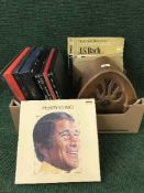 A box containing vintage style radio, Golden Eagle transistor,