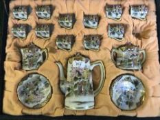 An antique Japanese eggshell tea service in case