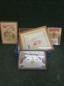 A box of seven framed pictures including Cadbury's and Jacobs advertising,