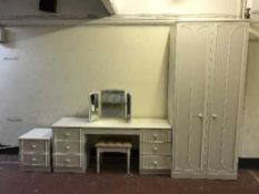 A contemporary white double door wardrobe with matching knee hole dressing table with mirror and