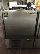 A Foster's stainless steel fridge