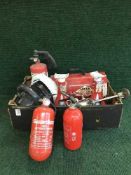 A Top-Weld 140 welder together with two Falck boxed fire extinguishers and a box containing space