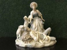 A Lladro porcelain group, a lady standing over a man sleeping against a tree stump,