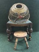 An early twentieth century oak dressing table stool together with a milking stool,