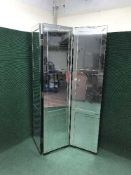 An all glass three-way room divider