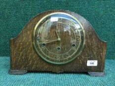 An oak Enfield mantel clock