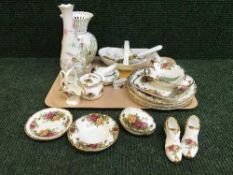 A tray of quantity of Royal Albert Country roses china, dishes, shoes,