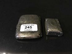 A silver card case, 2.