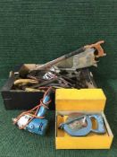 Two boxes of Ross circular saw attachment, hand saw, hammers,