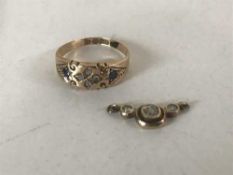 An 15ct gold sapphire and diamond ring and part diamond pendant