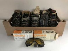 A quantity of vintage skis and poles,