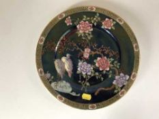 A Maling lustre plate depicting storks