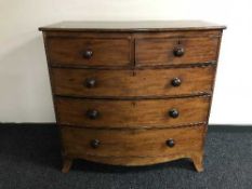 A Victorian mahogany bow-fronted five drawer chest