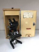 A medical microscope by Watson in a fitted box