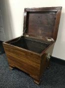 A Victorian mahogany coal box with liner