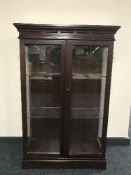 A mahogany Chapmans Siesta double glazed door display cabinet