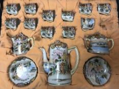 An antique Japanese eggshell tea service in case