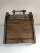 An Edwardian mahogany coal receiver with liner