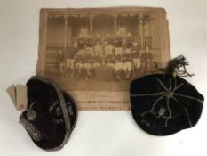 Two late 19th century South Shields football caps and a South Shields YMCA Football Team photograph