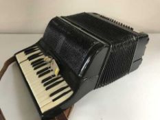 A cased piano accordion by Scandalli