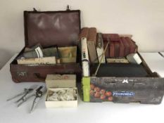 A box of miniature leather case of drawing instruments, assorted books, hair clippers,